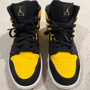 Air Jordan yellow sneakers.